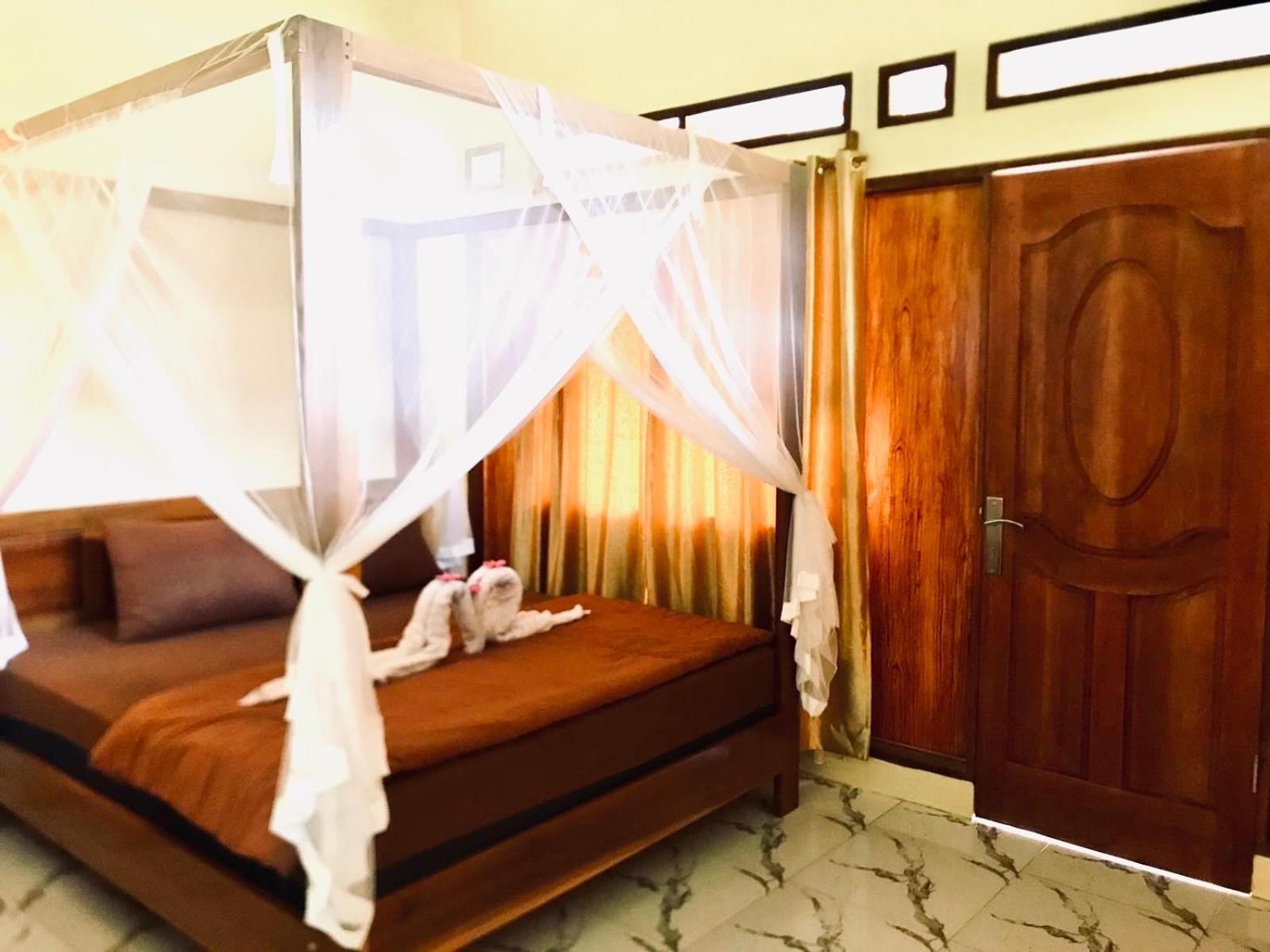 R5 Keramba Inn Bukit Lawang Esterno foto